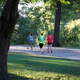 Runners enjoying Johnstone Park and the Pathfinder Parkway Trails.