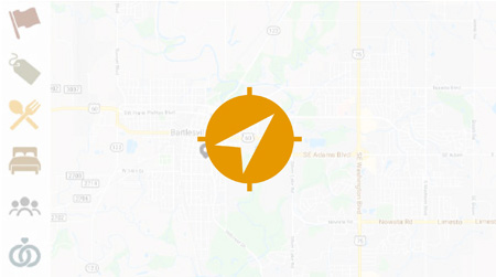 Pre-1900s photograph of Bartlesville with oil wells stretching to the horizon